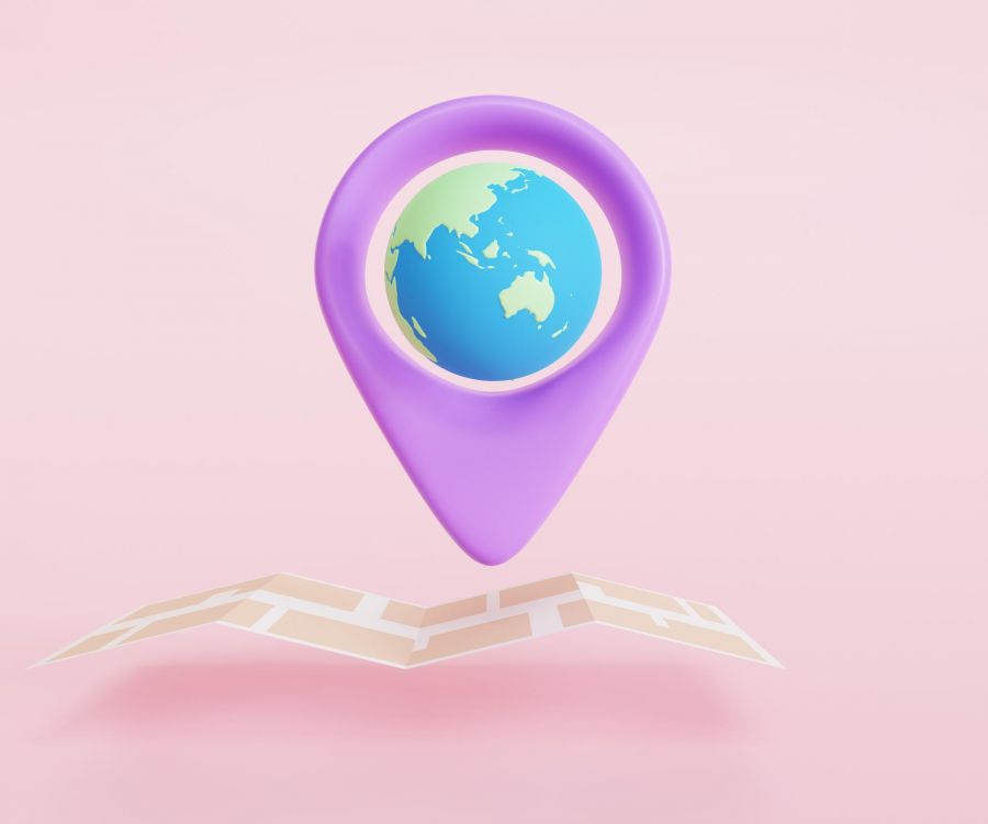 3D image of globe and map pin in pink