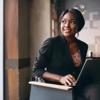 african-american-business-woman-working-computer-bar.jpg