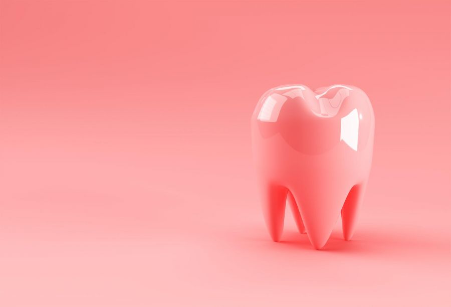 pink 3d tooth on pink background