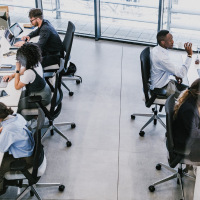 corporate office employees at their desks