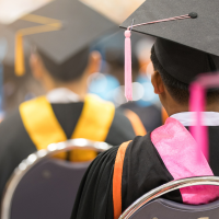 graduates in robes during a graduation ceremony