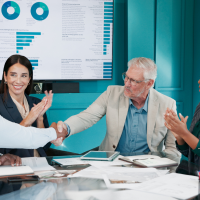 Diverse group of business people shaking hands