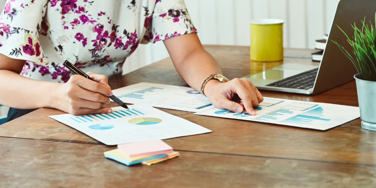female payroll professional assessing financial data
