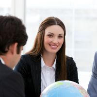 A woman considering the best countries to expand your business internationally 