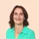 Tamalyn Ellerington Headshot with peach Background