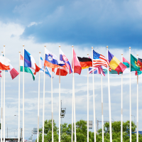 A host of national country flags flying in the air