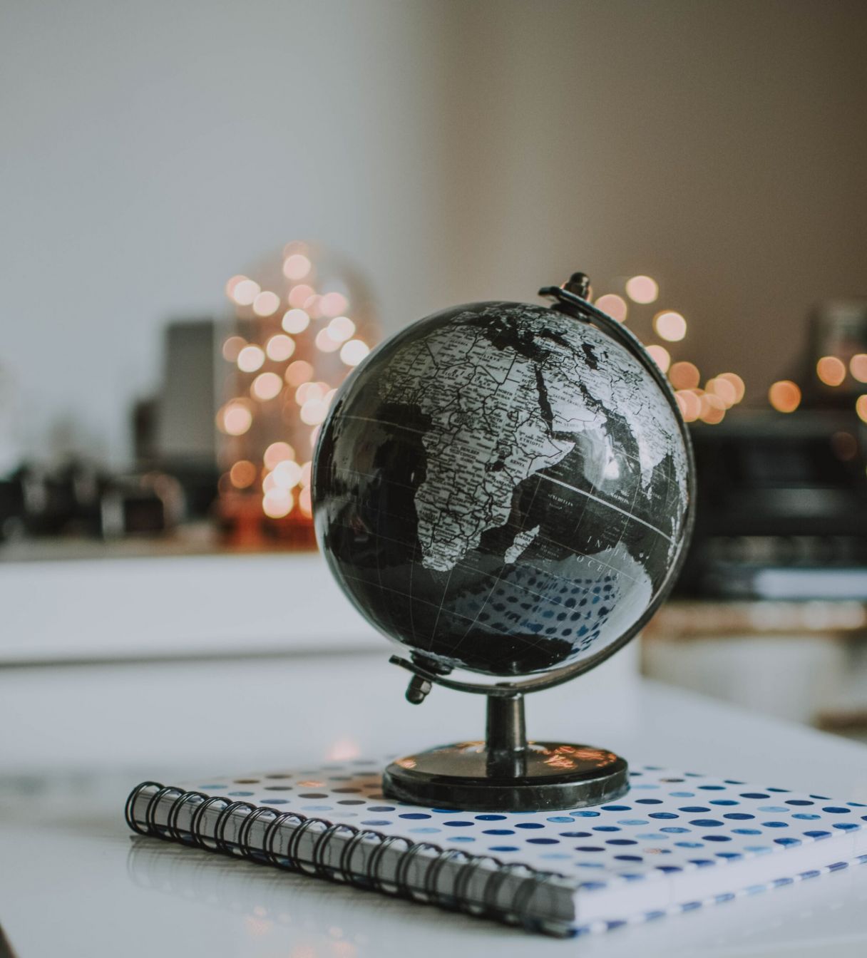 Image of a Globe on a Notebook