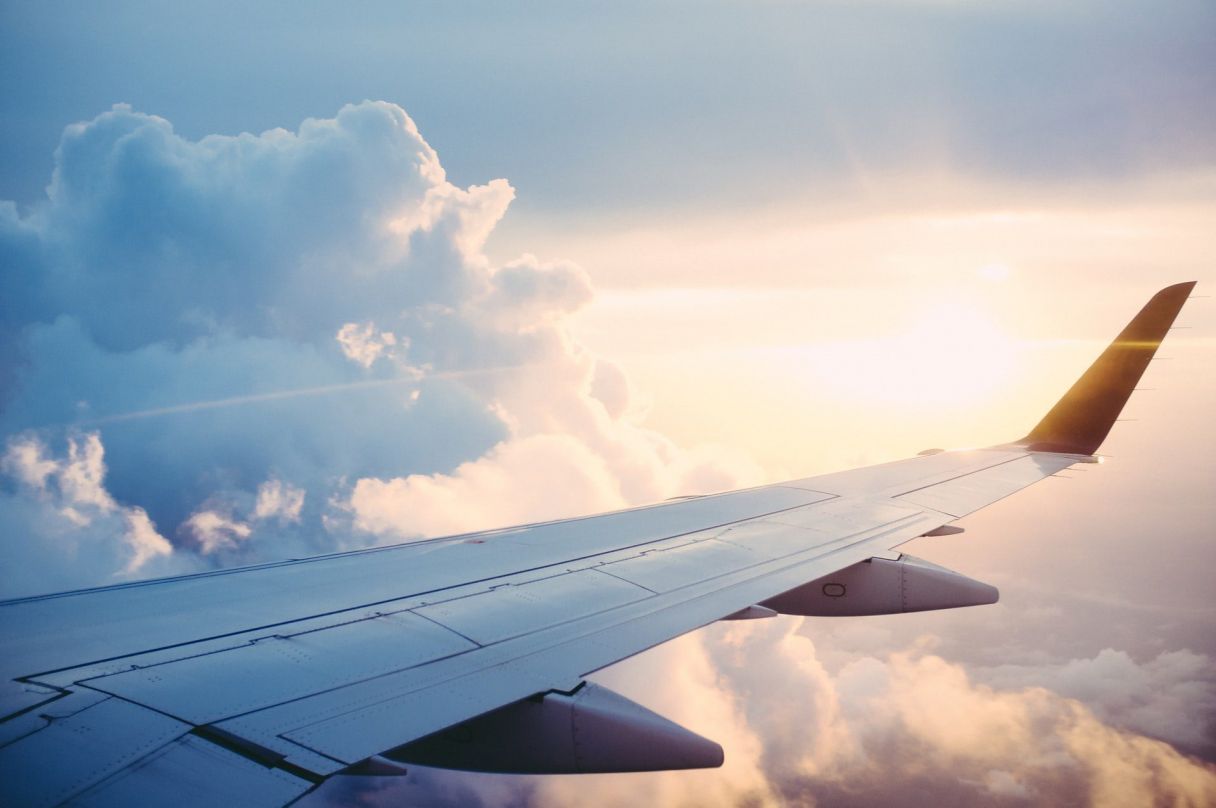 Aeroplane Wing In Flight - Photo by Ross Parmly on Unsplash