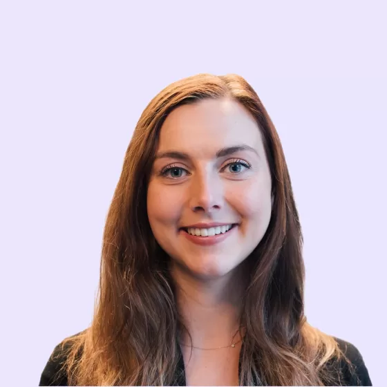 Ashleigh Duncan Headshot with Mauve Background