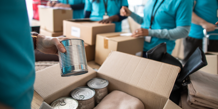 ngo workers packing aid boxes