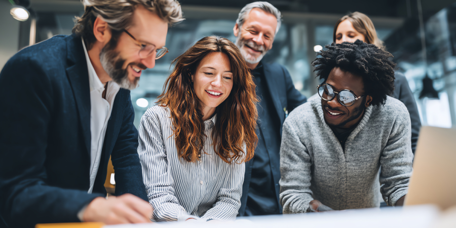 mixed team in happy discussion