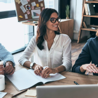 a mix of young professionals in a team meeting