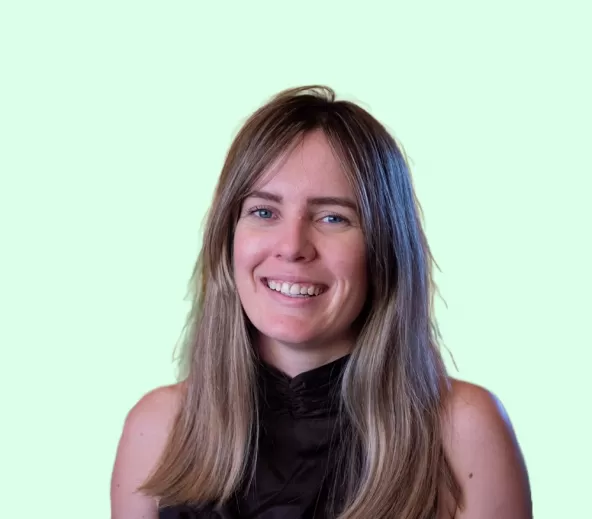 Britt Little headshot with Green Background