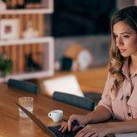 young woman working at home