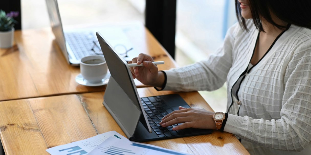 lady examining data on her laptop