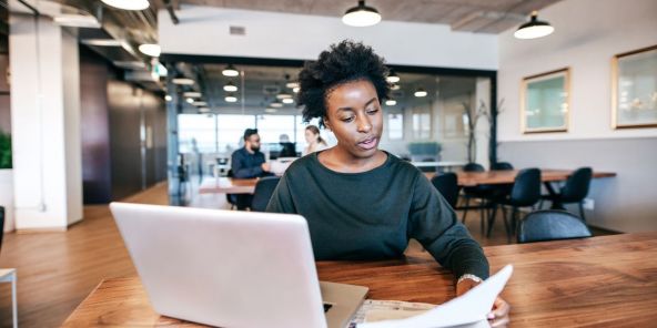 female worker at the laptop in the office