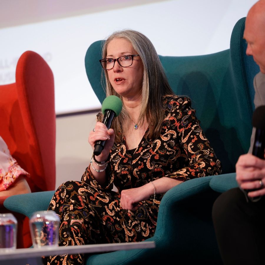 Teresa speaking to the Summit during the panel session