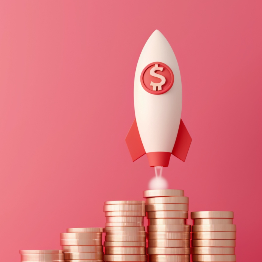 a rocket atop a stack of gold coins, against a coral red background