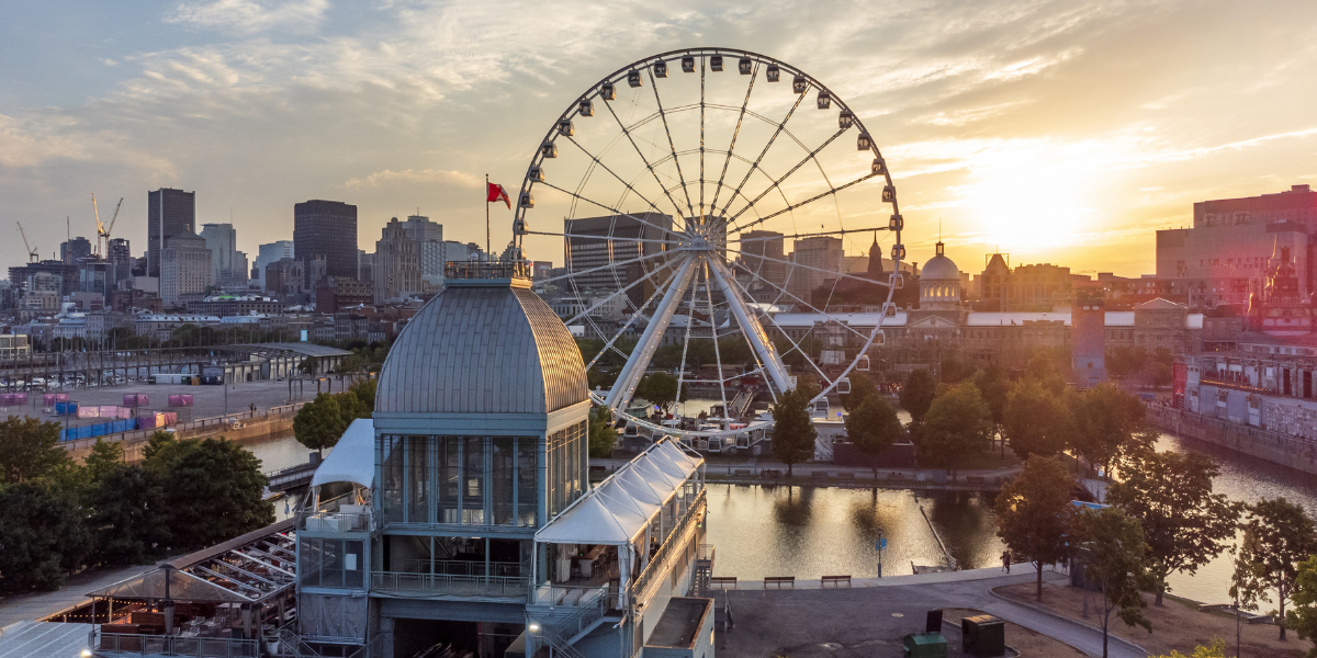 La Grande roue de Montreal Ferris Wheel during summer dusk in Quebec, Canada.