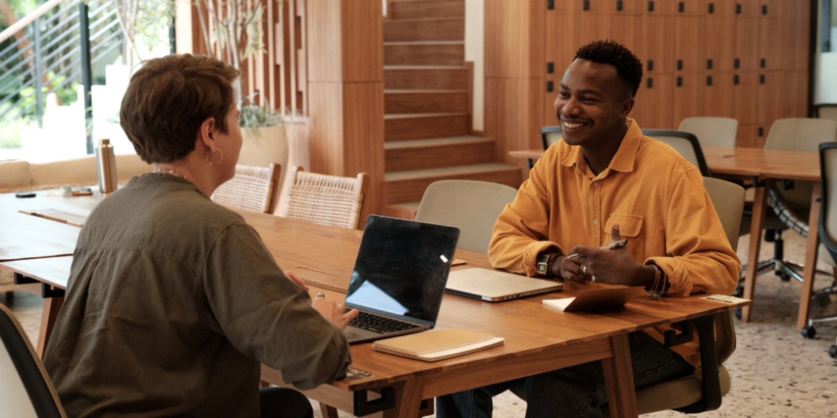 two colleagues in a work meeting