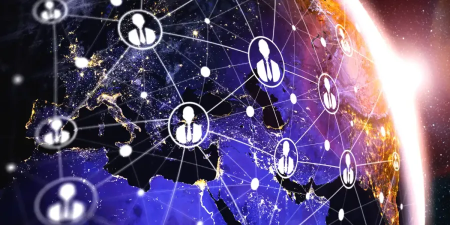 Earth, as seen from space, dotted with connected people icons