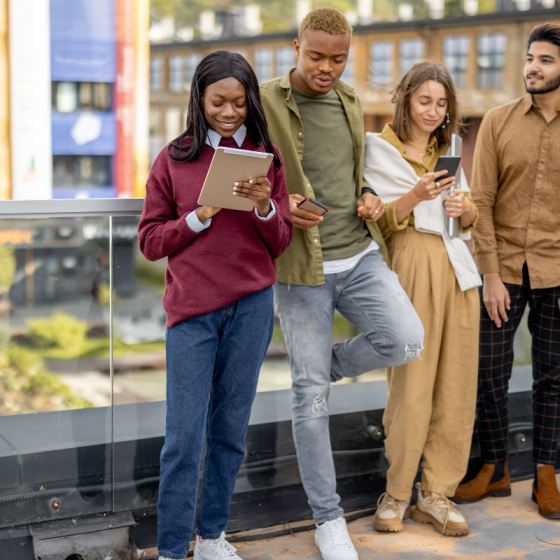 international students hanging out on campus