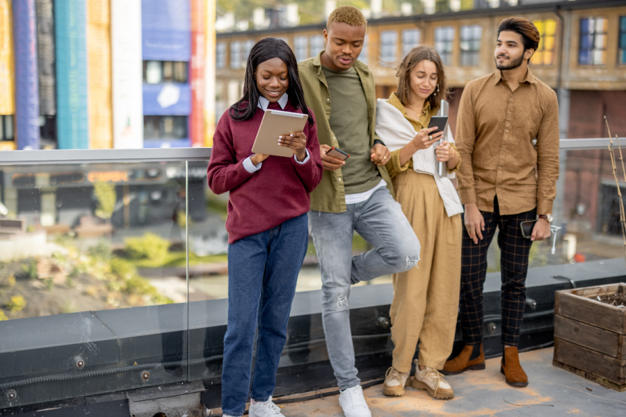 international students hanging out on campus