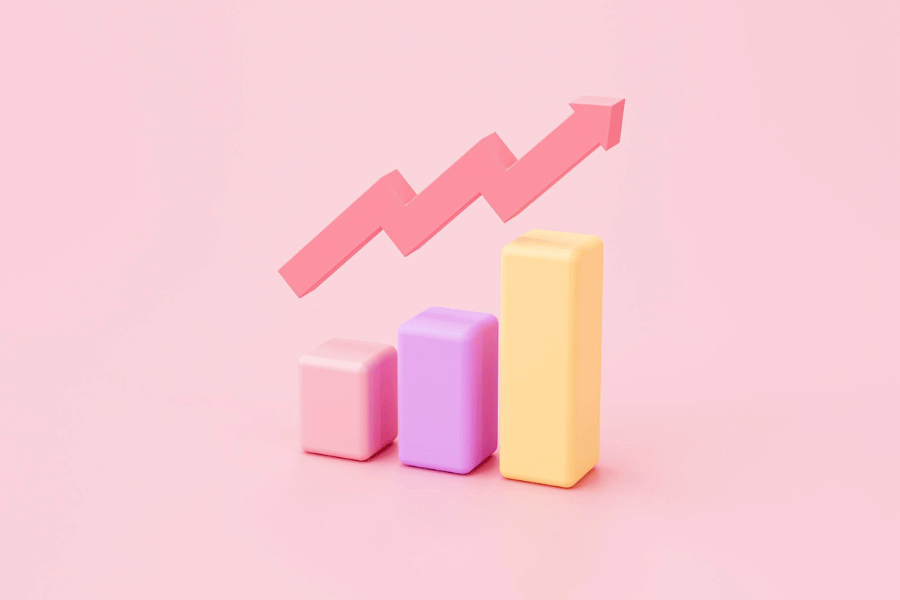 A pink arrow with an upwards trajectory atop a bar chart