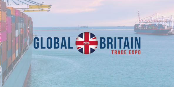 the words 'Global Britain Trade Expo' in dark blue on a transparent white overlay on top of a photo a cargo ship laden with colourful shipping containers docked at a port