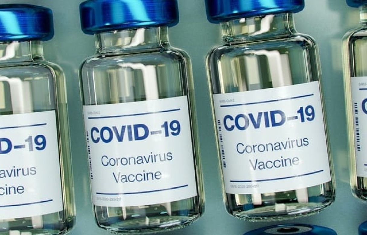 Bottles of Covid Vaccine - Photo by Daniel Schludi on Unsplash