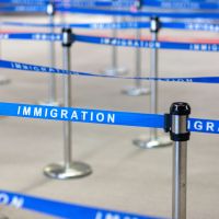 A close-up of an airport's immigration queue