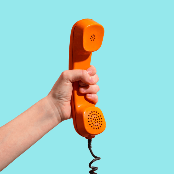 A hand holding a red phone against a neon blue background