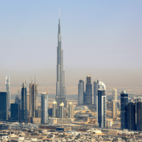 Image of a Dubai skyline in muted colours featuring the Burj Khalifa