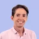 Jaime Bustamante Headshot with Mauve Background 