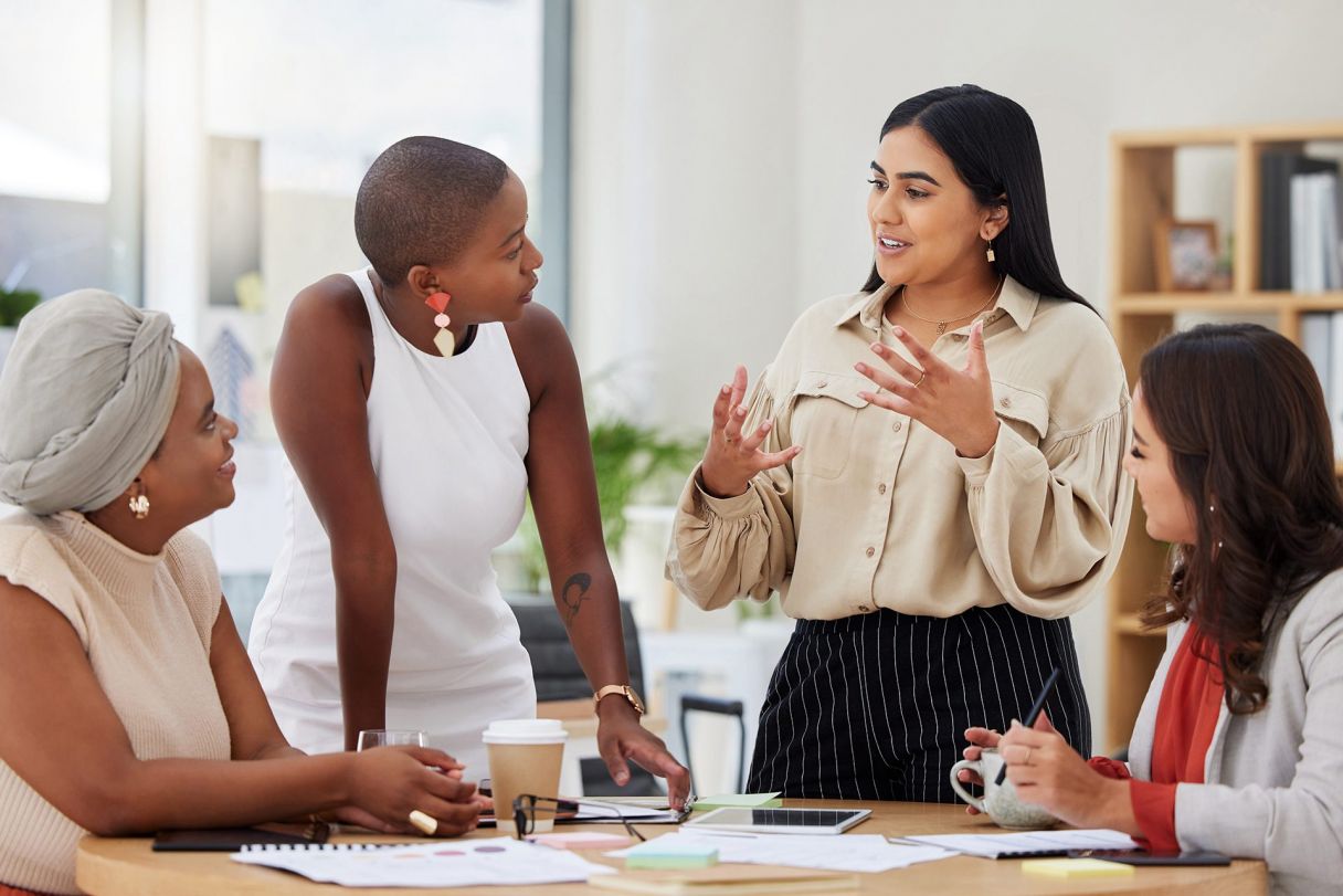 a female colleague explaining what is permanent establishment risk