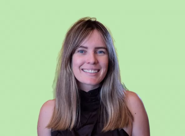 Britt Little Headshot with Green Background