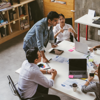 Asian colleagues in discussion